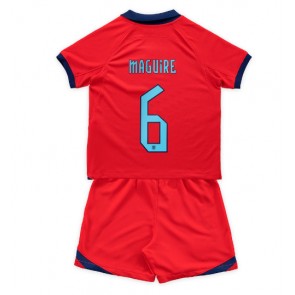 England Harry Maguire #6 Borta Kläder Barn VM 2022 Kortärmad (+ Korta byxor)